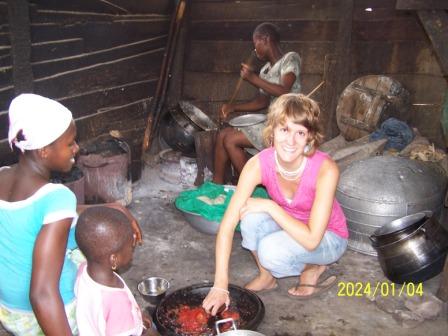 A volunteer cooking.